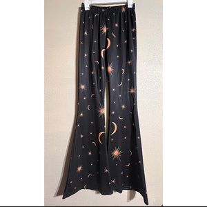 Sun, Moon & Star Gold & Black Flare Pants from Nasty Gal!